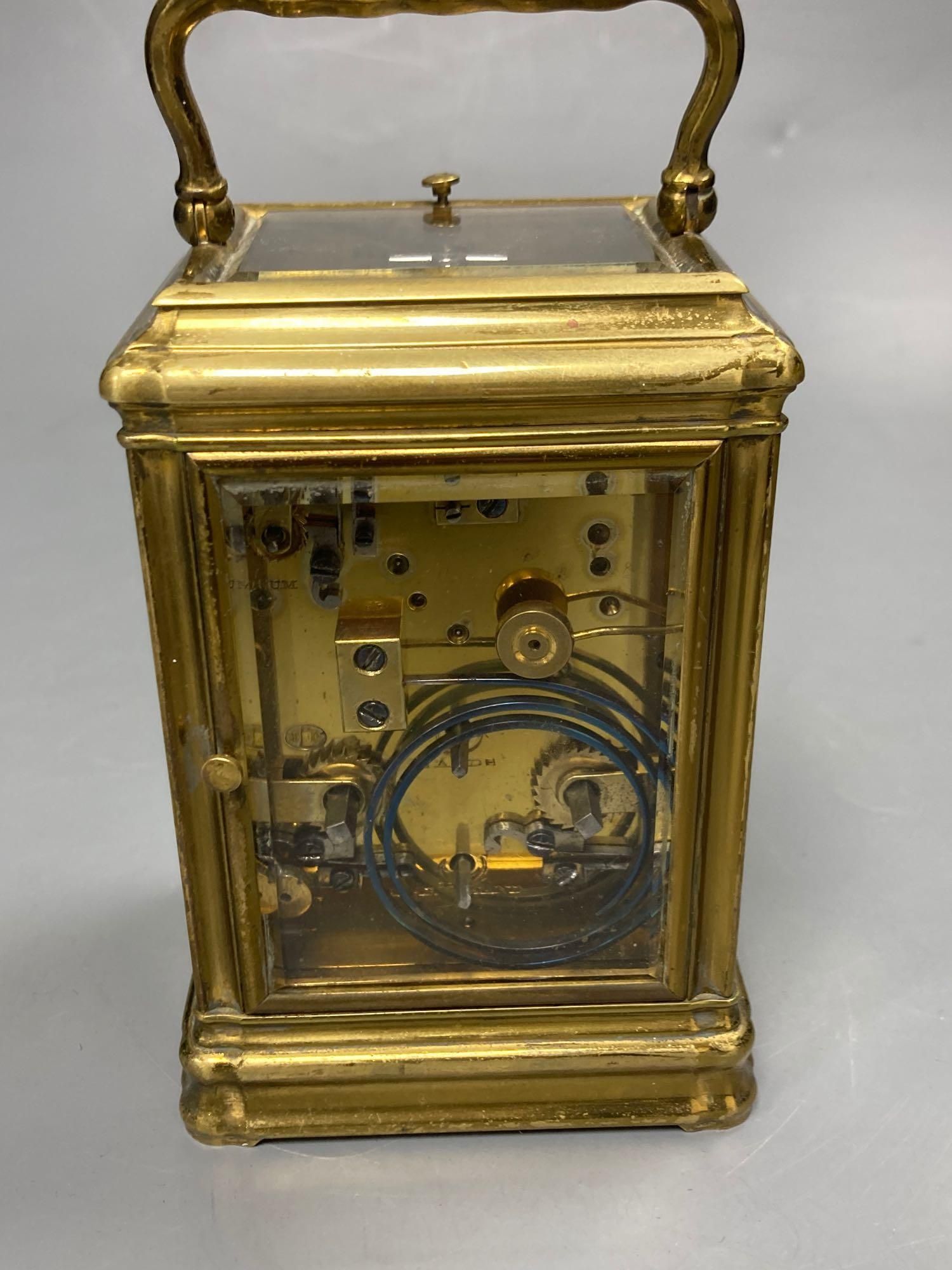 A brass repeating carriage clock- Drocourt, in gorge case, 16cm high including handle
